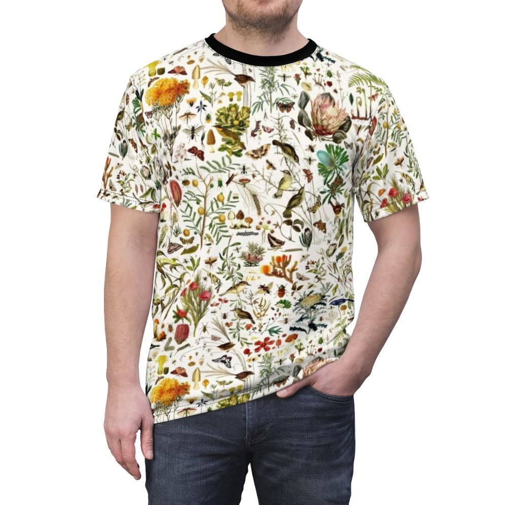 Detailed, colorful t-shirt design featuring a repeating pattern of Australian flora and fauna, including butterflies, birds, and native plants. - men front