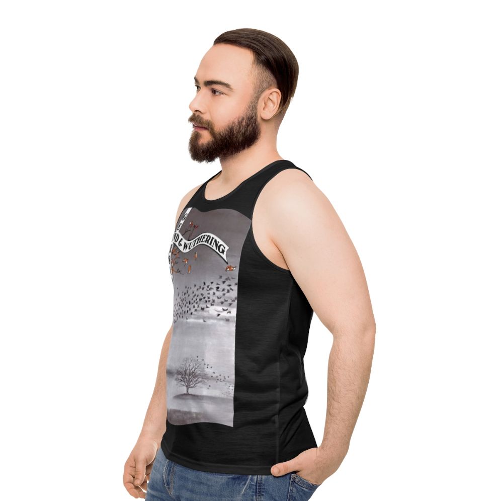 Vintage 'Wind and Wuthering' unisex tank top featuring Genesis album artwork - men side