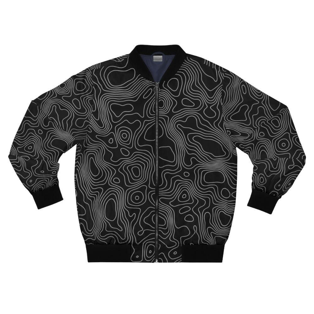 A minimalist bomber jacket featuring a topographic contour line abstract design in black and white.