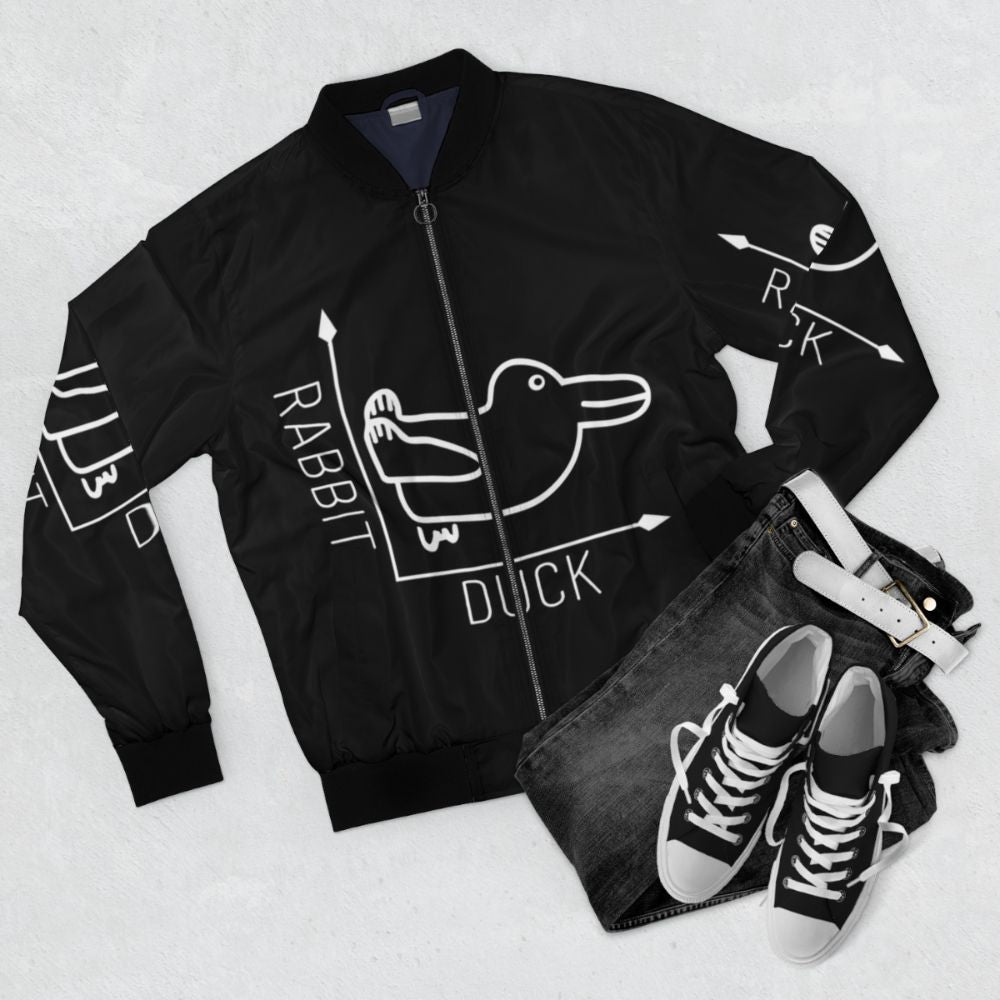 A bomber jacket featuring the famous Wittgenstein rabbit-duck illusion, representing the philosophical concept of perspective and language. - Flat lay