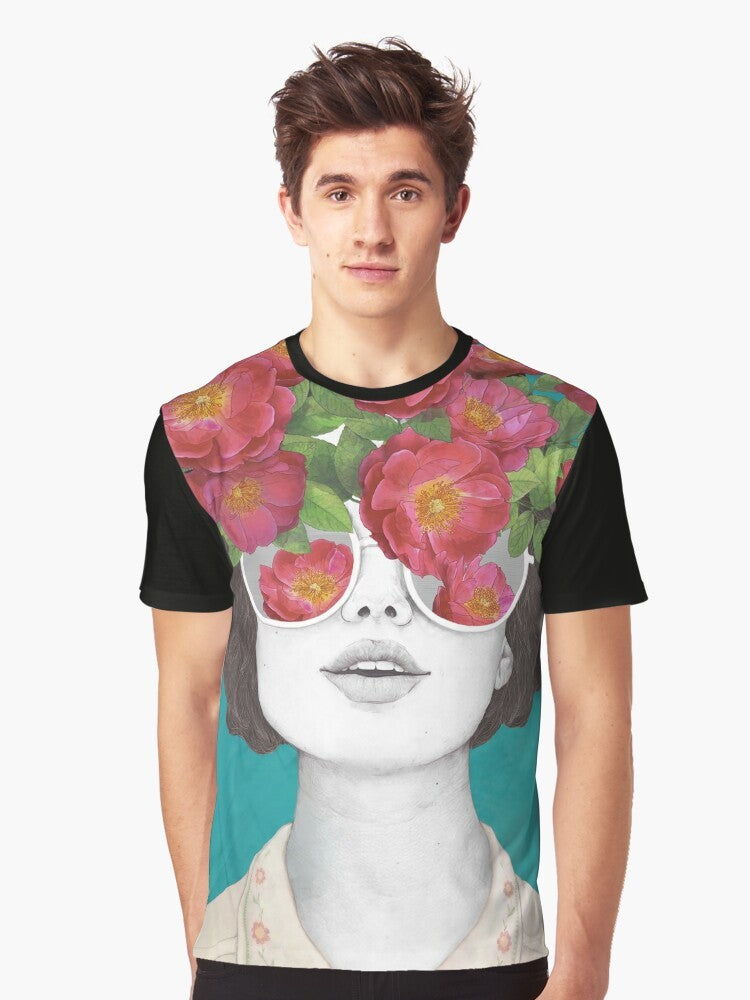 A surrealist graphic t-shirt featuring a woman's face with rose tinted glasses, surrounded by a watercolor floral design. - Men