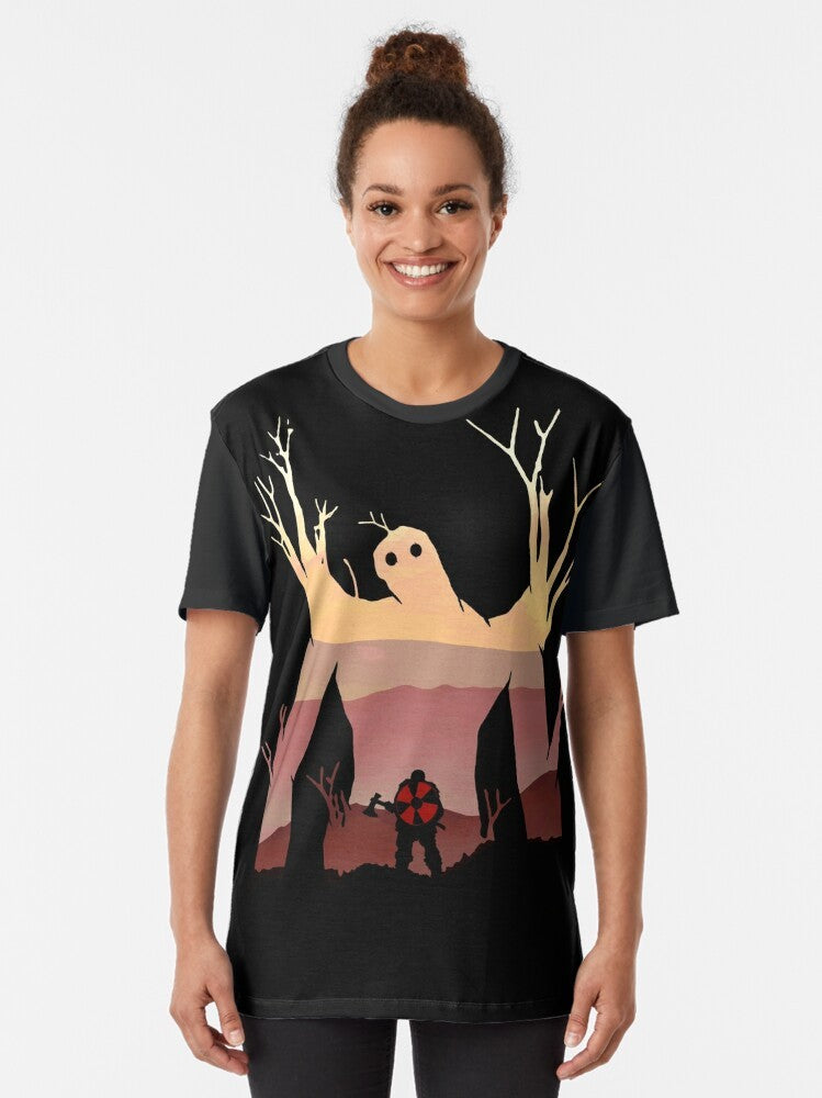 Valheim Elder Boss Graphic T-Shirt featuring a detailed illustration of the Elder, a formidable boss from the popular video game Valheim. - Women