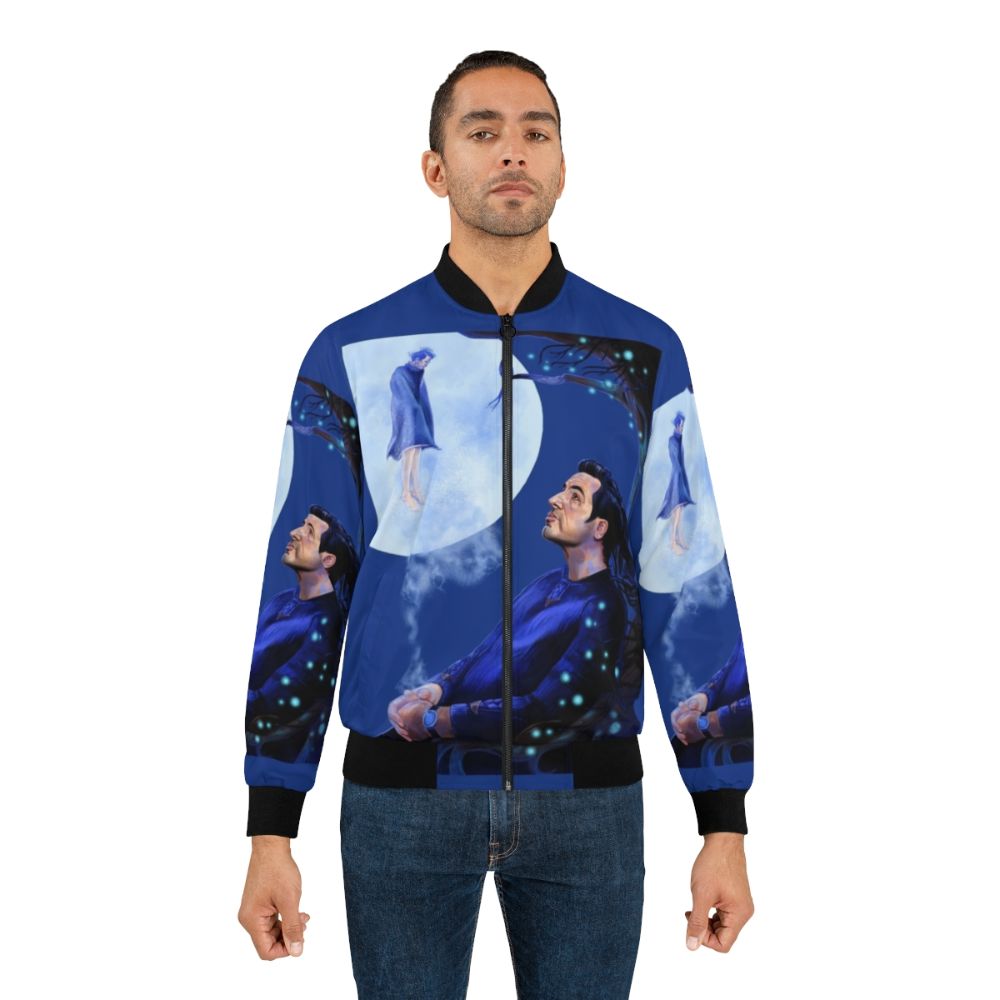 A bomber jacket featuring a magical moonlit night scene with a man, tree, owl, and other fantastical elements inspired by Claes Bang's portrayal of Dracula. - Lifestyle