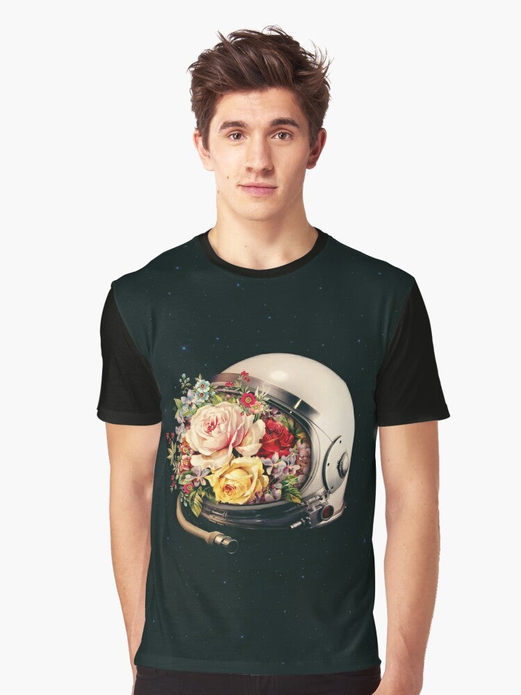 A surreal graphic t-shirt featuring an astronaut in space surrounded by flowers and stars - Men