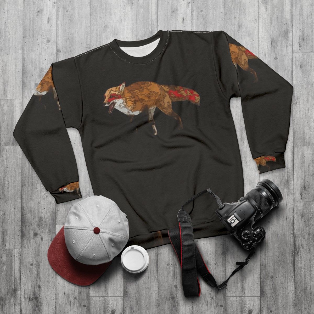 Kitsune spirit fox sweatshirt featuring a laughing red fox - flat lay