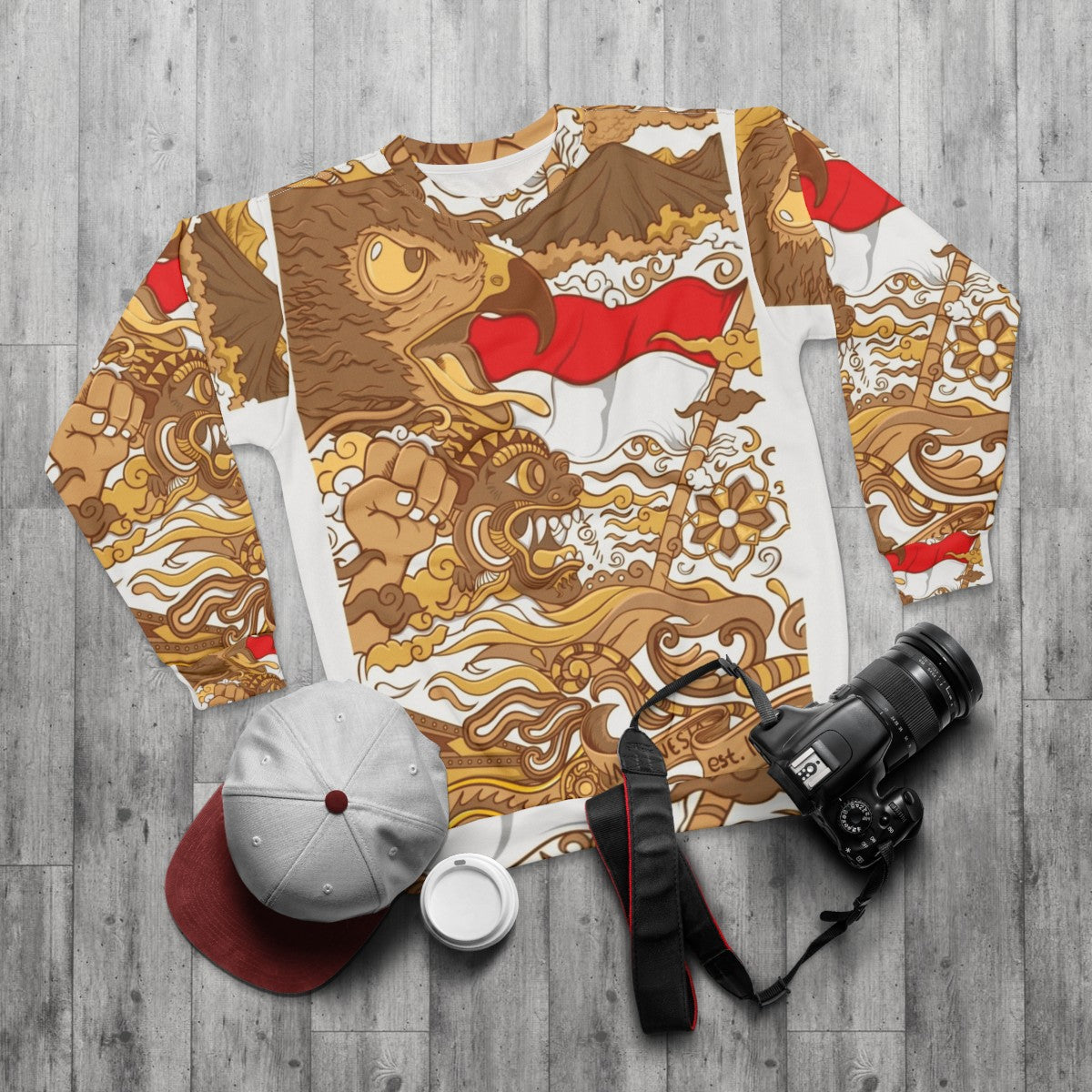 Authentic Indonesian sweatshirt with barong pattern and garuda eagle logo - flat lay