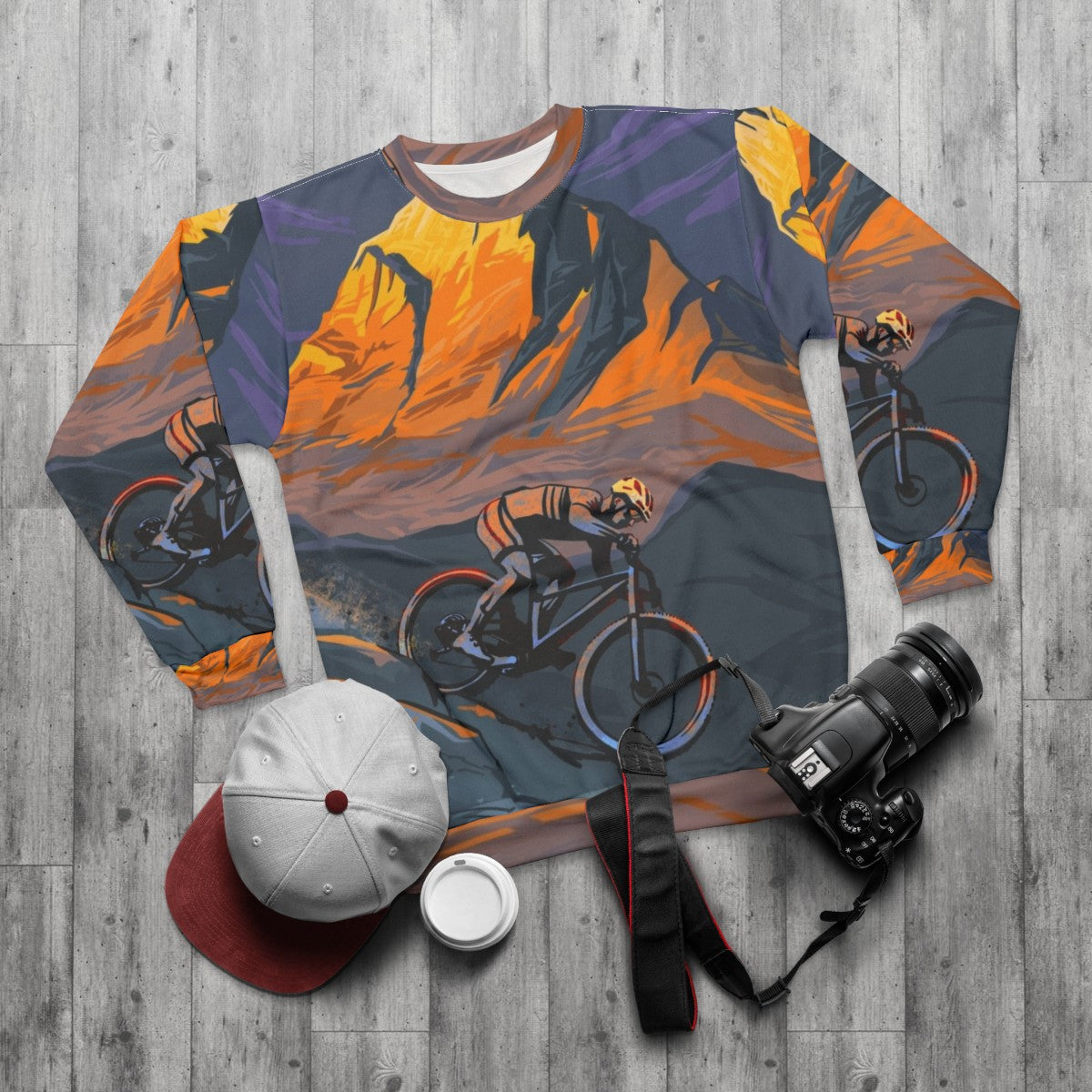 Sunset Peak Mountain Biker Sweatshirt with Cycling Art Design - flat lay