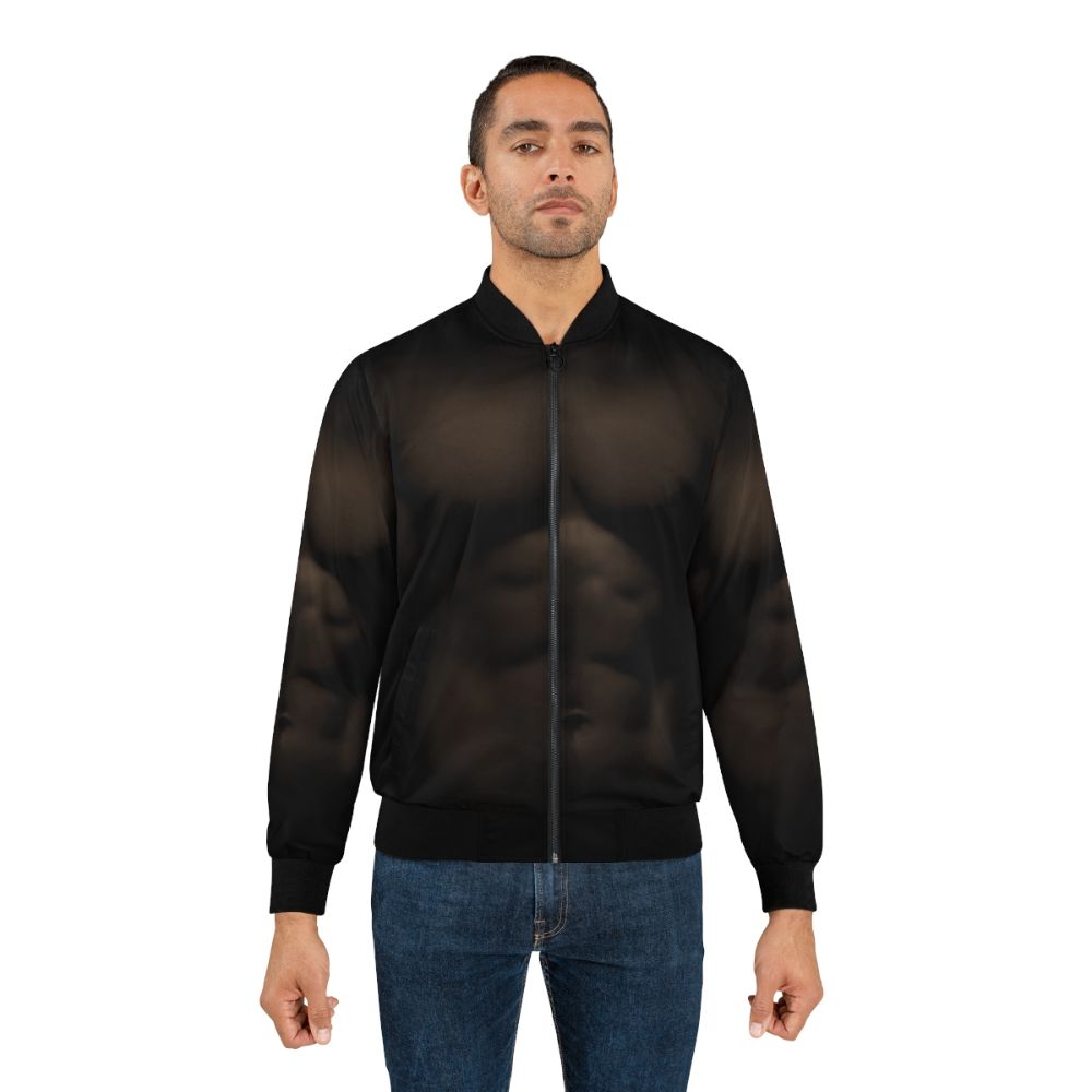 Muscular man wearing a bomber jacket showcasing his chest and abdominal muscles - Lifestyle