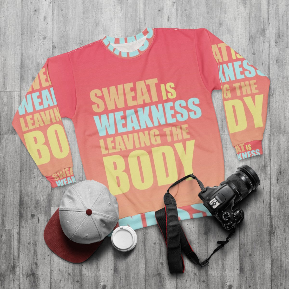 Motivational 'Space Force' sweatshirt with 'Sweat is Weakness Leaving the Body' design - flat lay