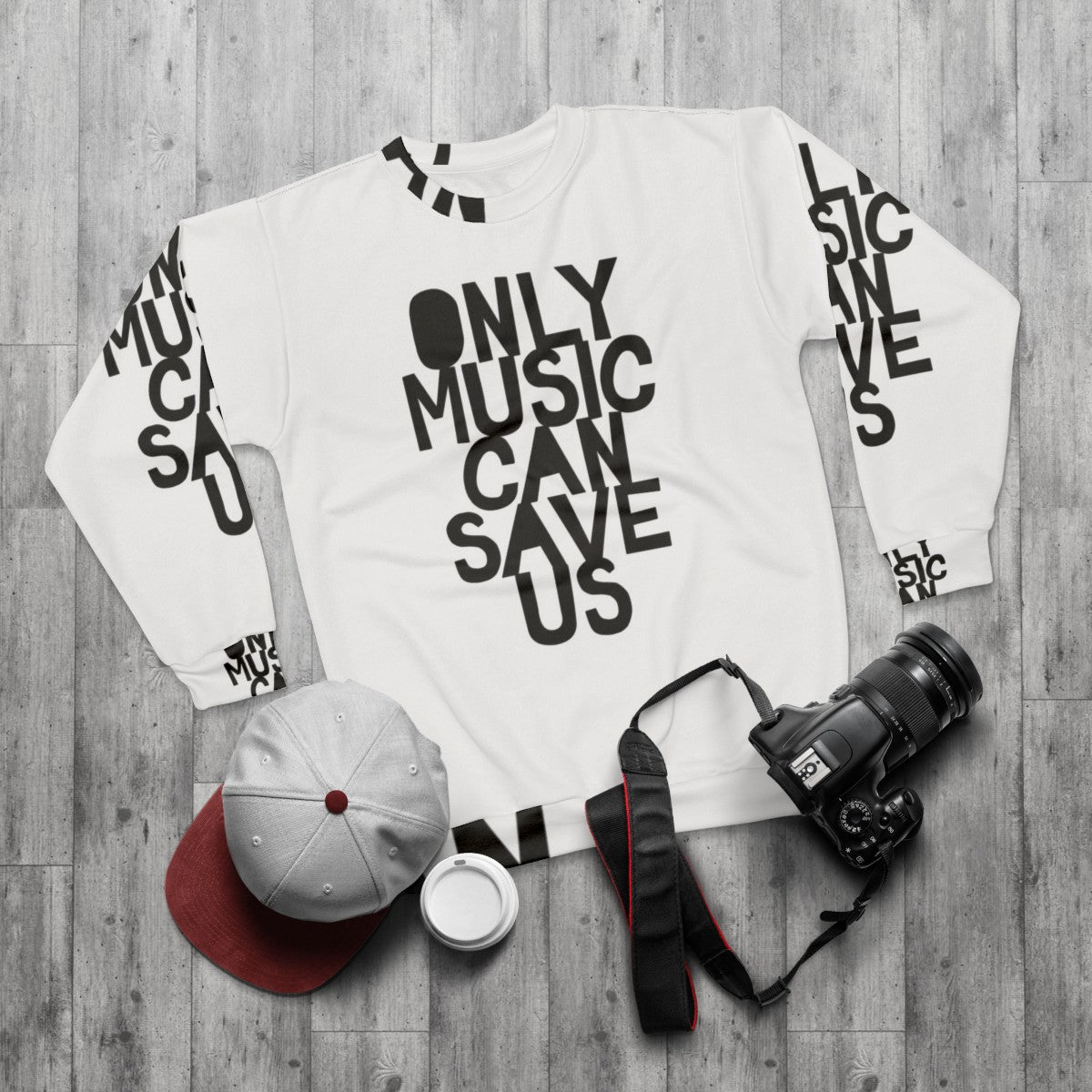 "Only Music Can Save Us" music sweatshirt with bold, hand-drawn typography - flat lay