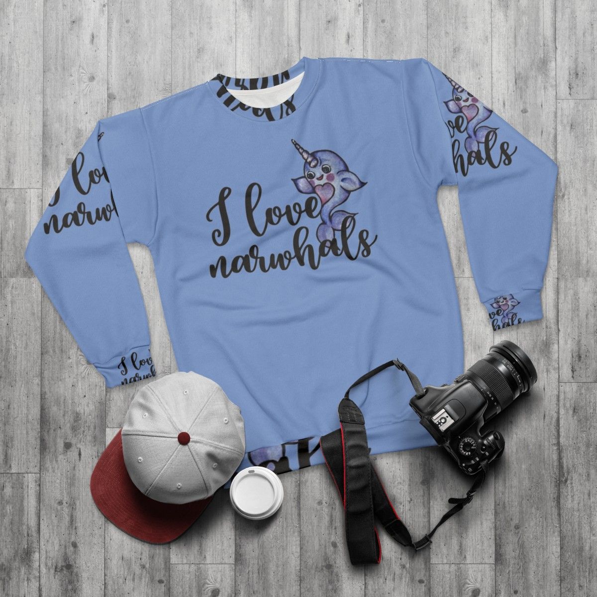 Soft pink and purple sweatshirt with a cute narwhal graphic - flat lay