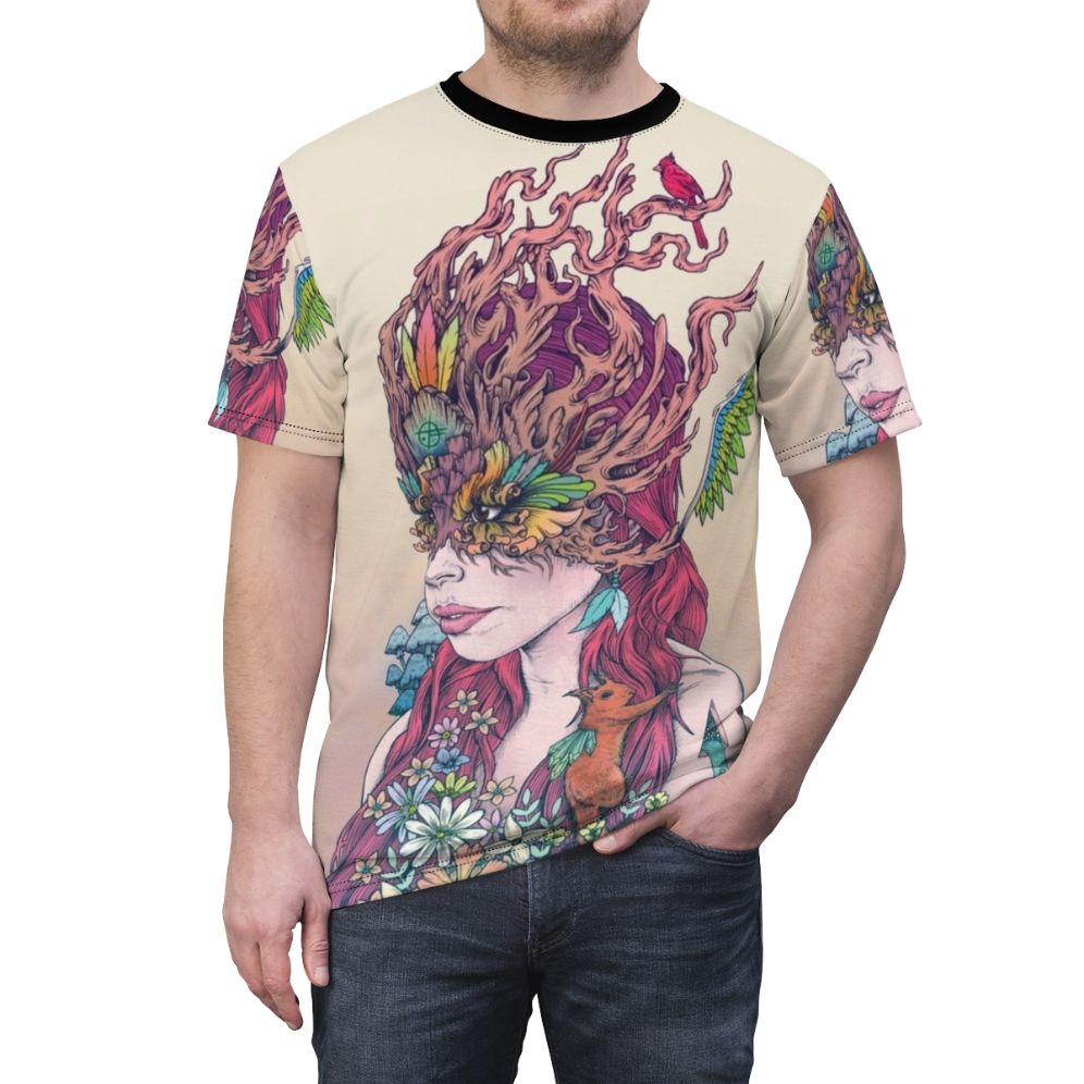 Whimsical t-shirt design featuring psychedelic art with fantasy nature elements, including a woman with red hair, animals like a cardinal and squirrel, and vibrant floral patterns. - men front