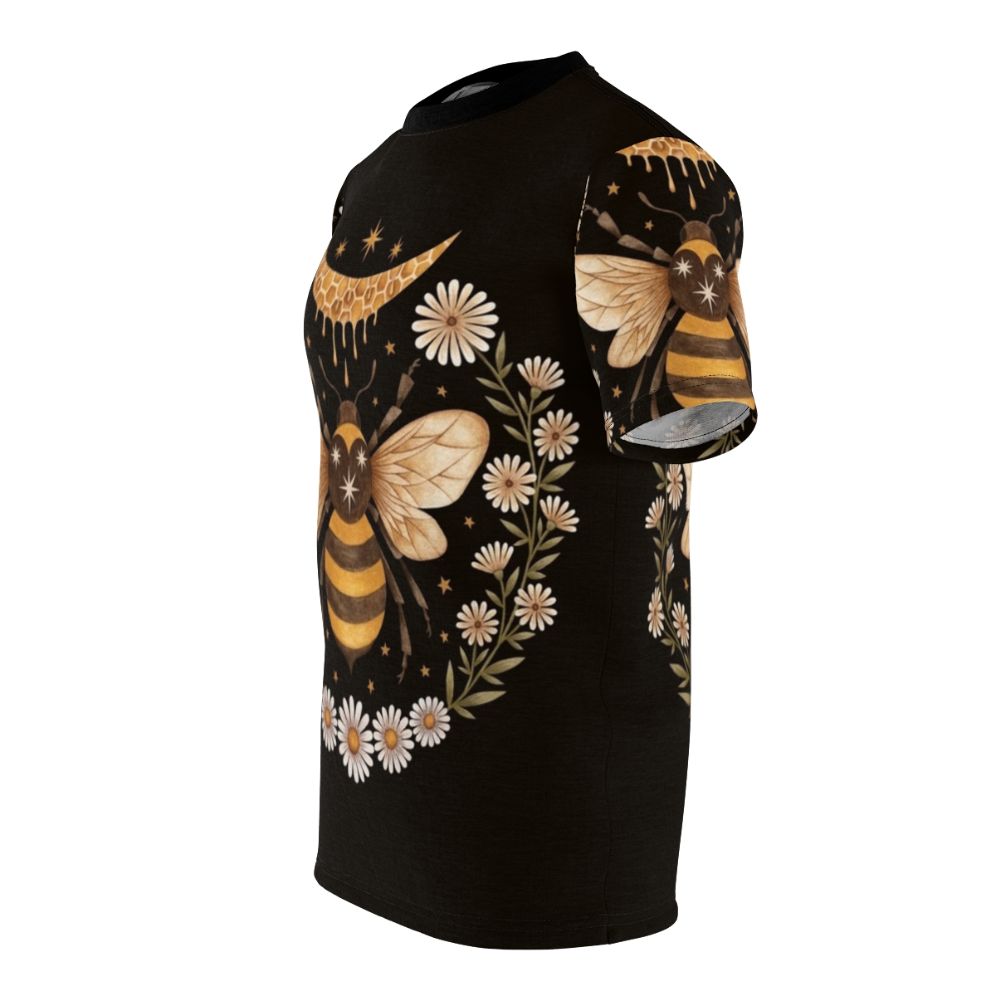 A black t-shirt featuring a honey moon design with bees, flowers, and a laurel wreath - men left