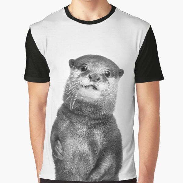 Graphic tee with a cute black and white otter portrait in a nature setting