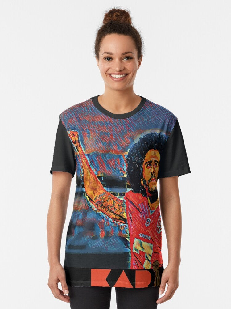 Graphic t-shirt with "Tha Liberator" design, featuring an illustration of Colin Kaepernick kneeling in protest. - Women