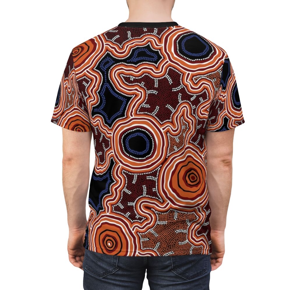 Authentic Aboriginal dot art painting depicting pathways to water on a high-quality t-shirt - men back