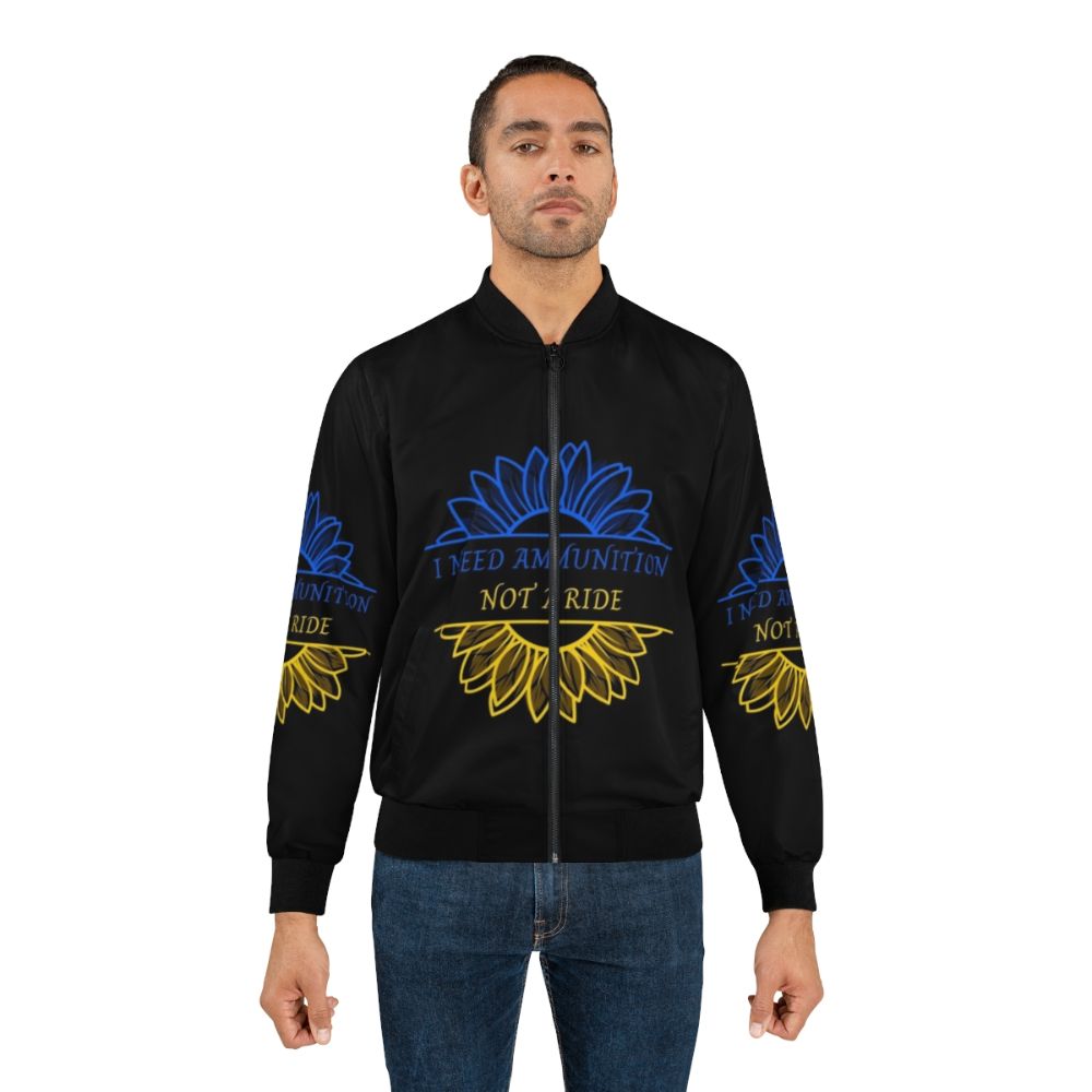 A blue and yellow bomber jacket with a sunflower design, representing the colors of the Ukrainian flag. - Lifestyle