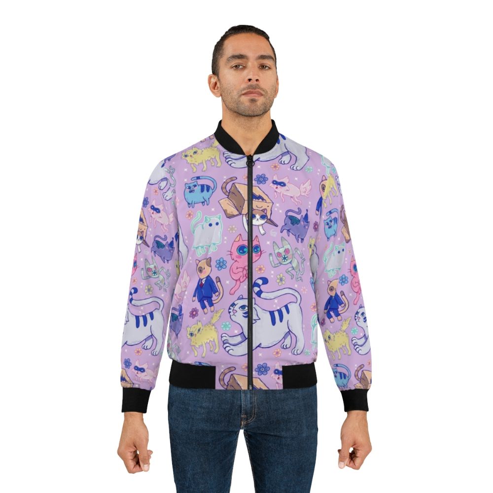 A colorful bomber jacket featuring an adventure time-inspired cat and flower pattern design. - Lifestyle