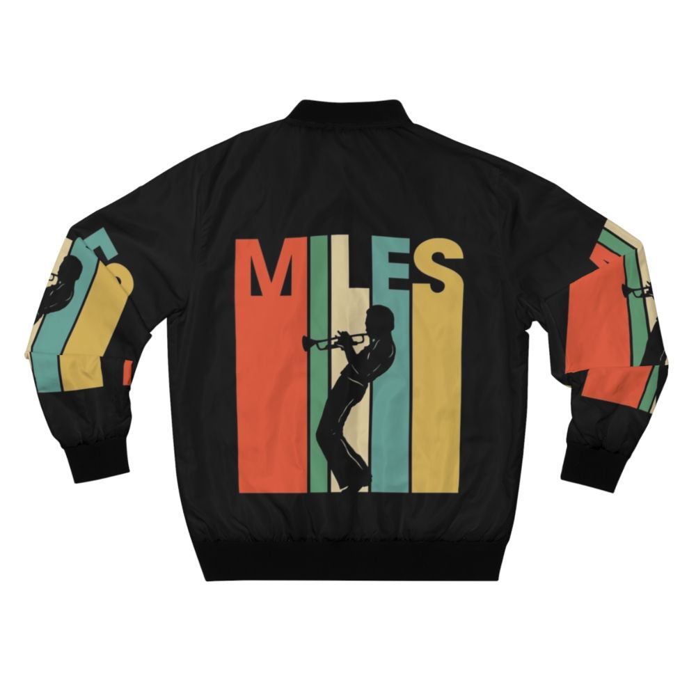 Vintage blue bomber jacket featuring the iconic trumpet and silhouette of jazz legend Miles Davis - Back