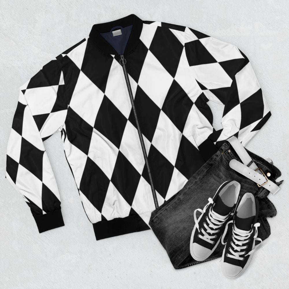 Harlequin diamonds bomber jacket in black and white monochrome pattern - Flat lay