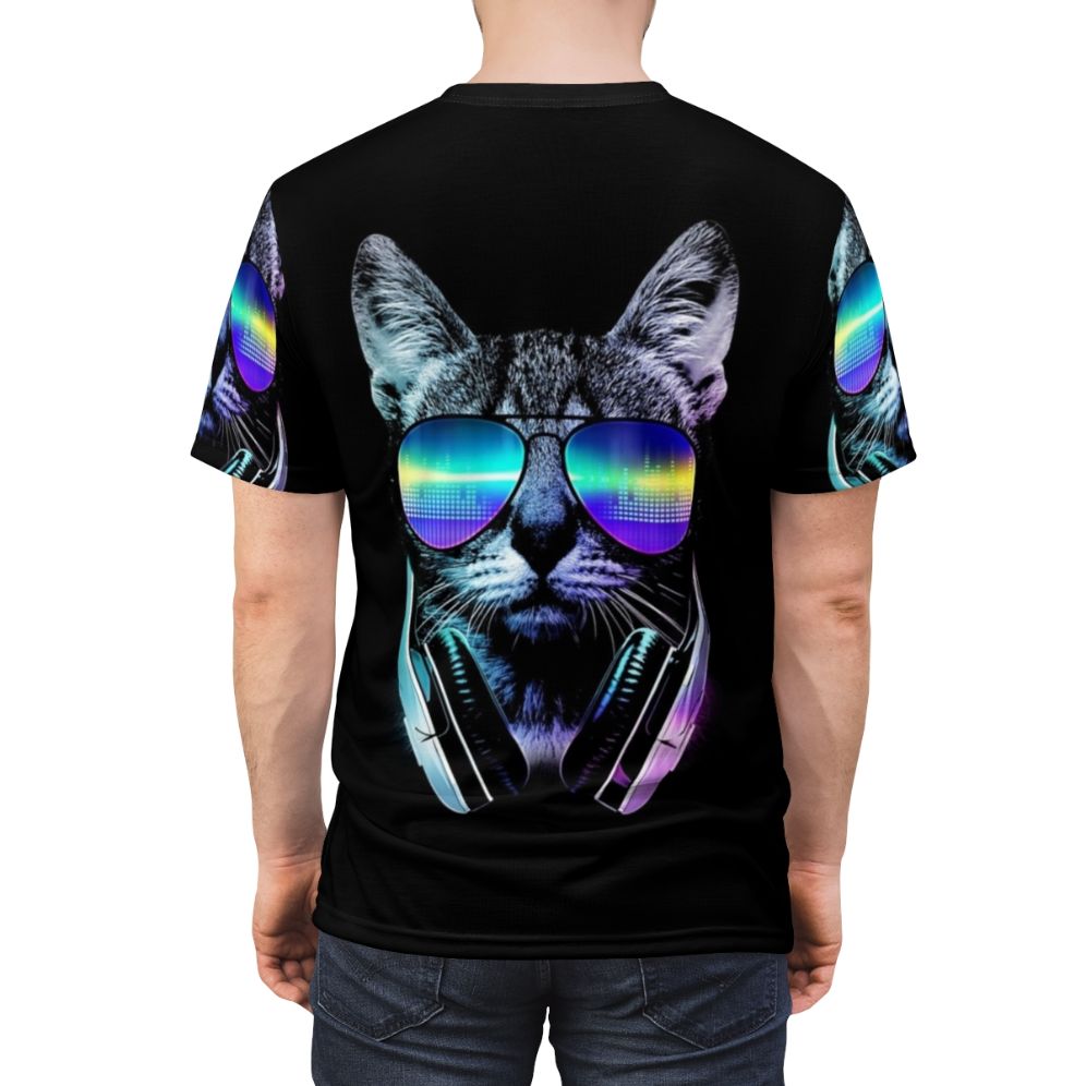 Illustration of a cat wearing headphones against a neon city skyline background on a t-shirt - men back