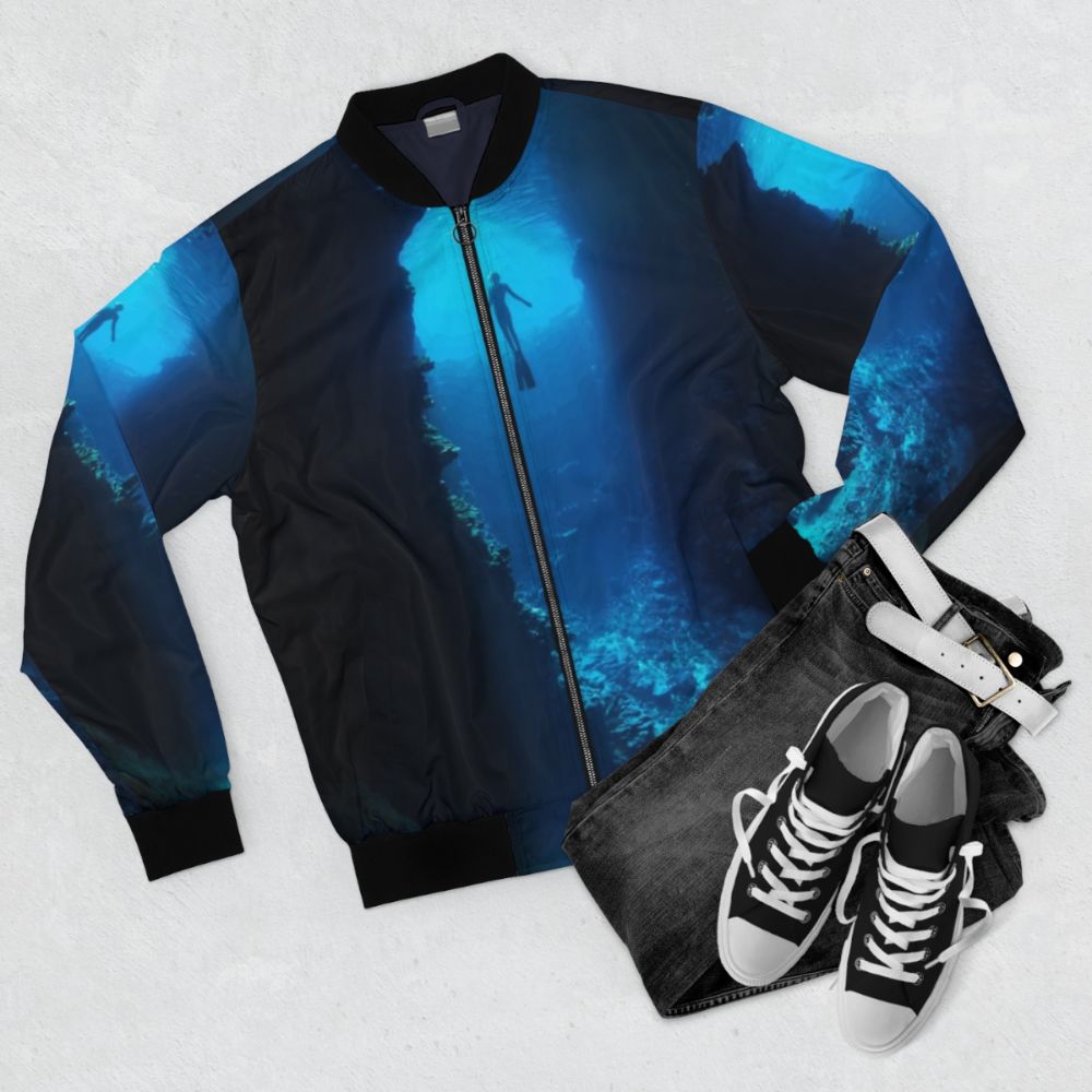 A stylish free diver bomber jacket for spearfishing and ocean exploration - Flat lay