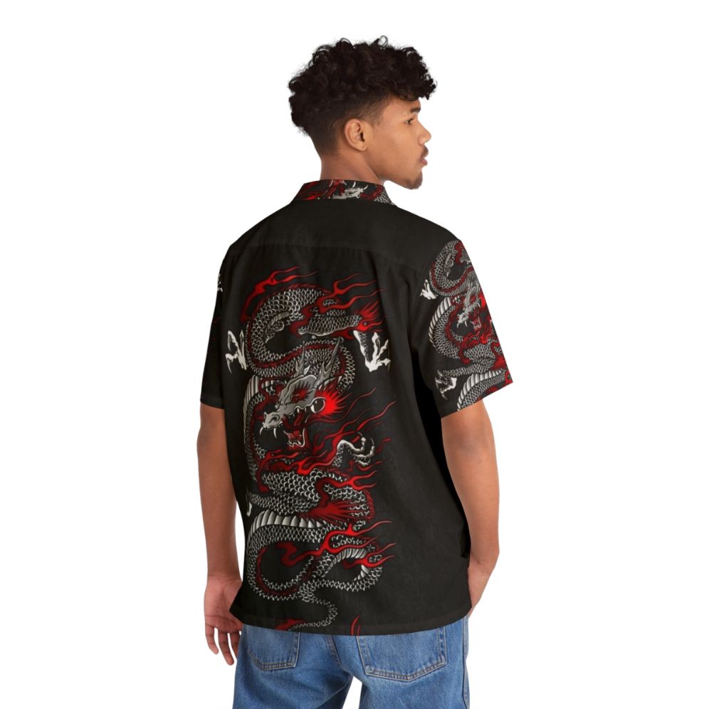 Embroidered asian dragon design on a tropical hawaiian shirt - Flat lay