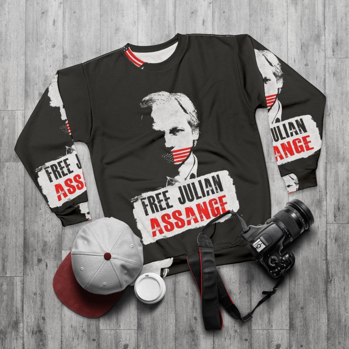 Free Julian Assange Sweatshirt with Wikileaks and Activism Imagery - flat lay