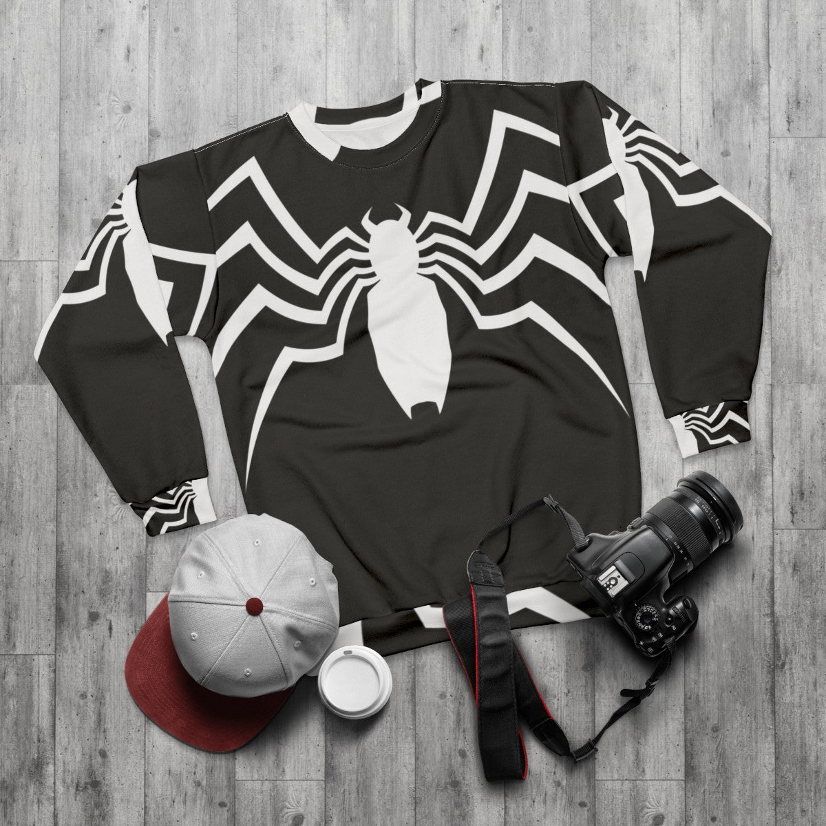 Spider-themed sweatshirt with a minimalist design - flat lay