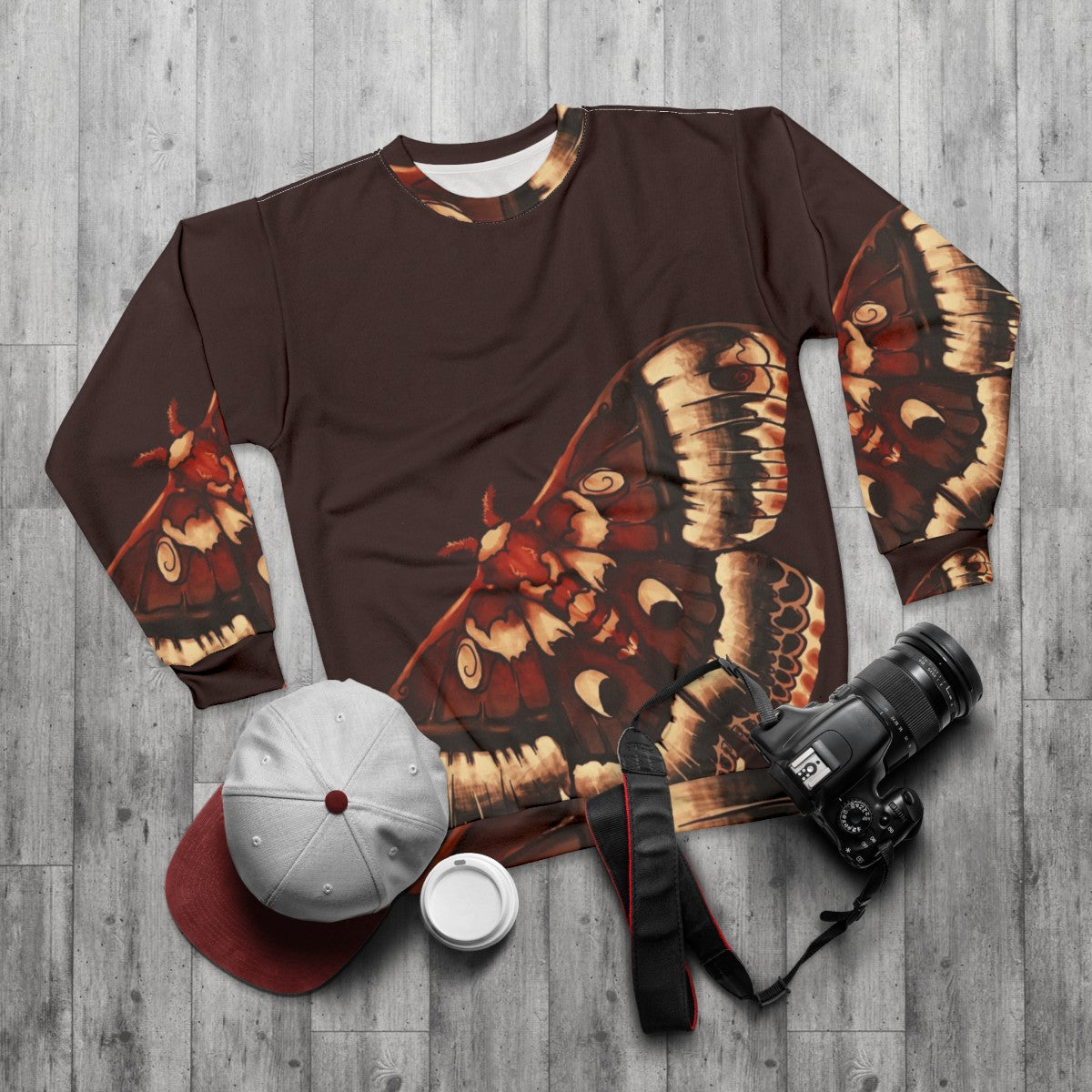 Cecropia moth graphic on a cozy sweatshirt - flat lay