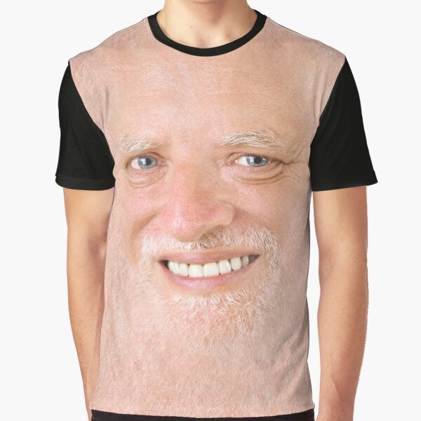 A graphic t-shirt featuring the "Hide The Pain Harold" meme, a popular internet meme of an older man smiling awkwardly.