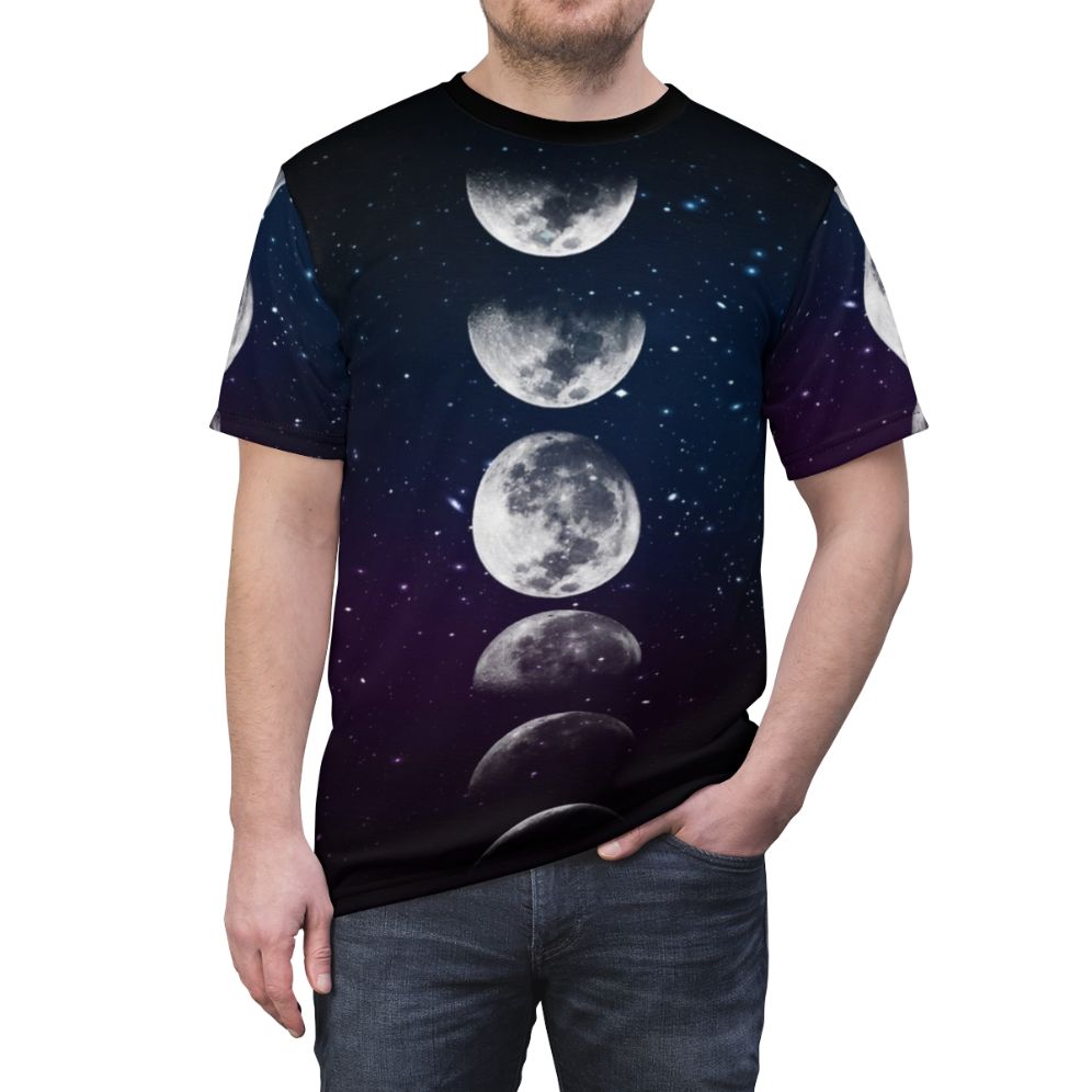 Unisex t-shirt featuring a watercolor design with the phases of the moon and a cosmic, space-inspired aesthetic. - men front