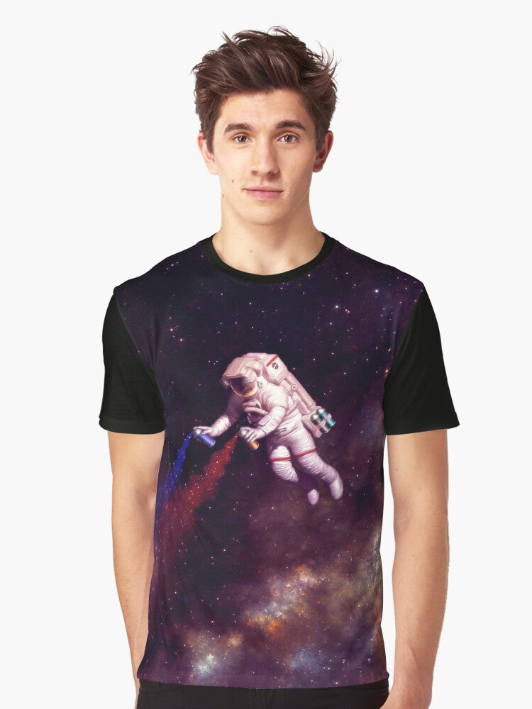 Astronaut wearing a colorful galaxy and spray paint graphic t-shirt design - Men