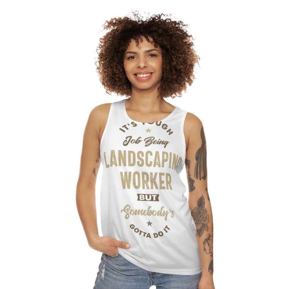 Landscaping worker wearing unisex tank top - women