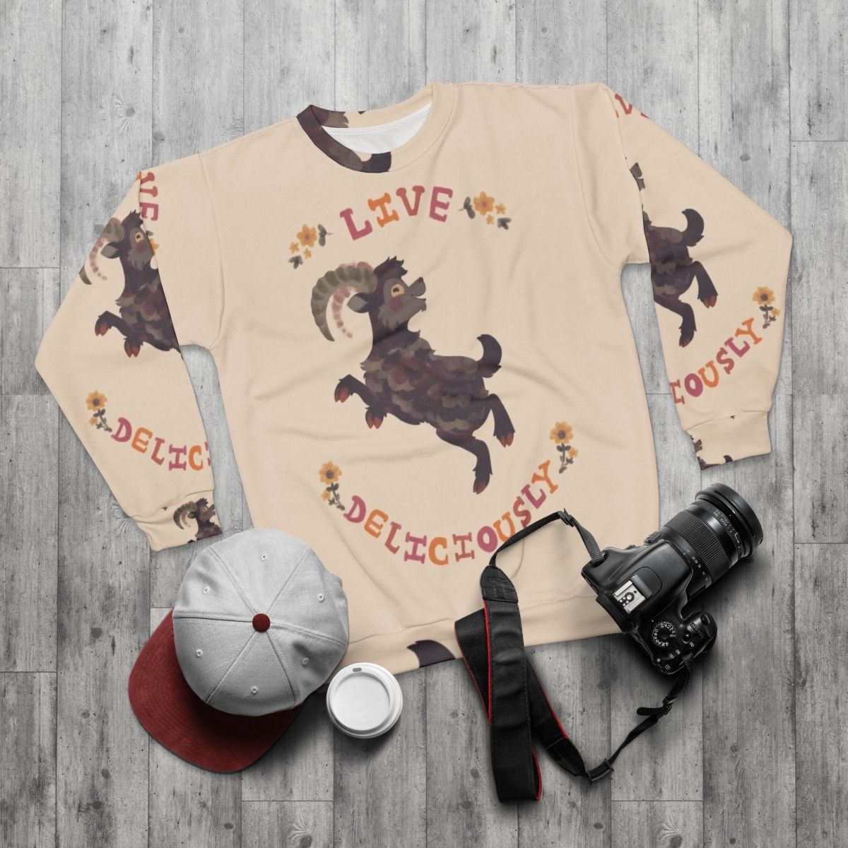 Live Deliciously Sweatshirt with Witch, Horror, and Halloween Imagery - flat lay