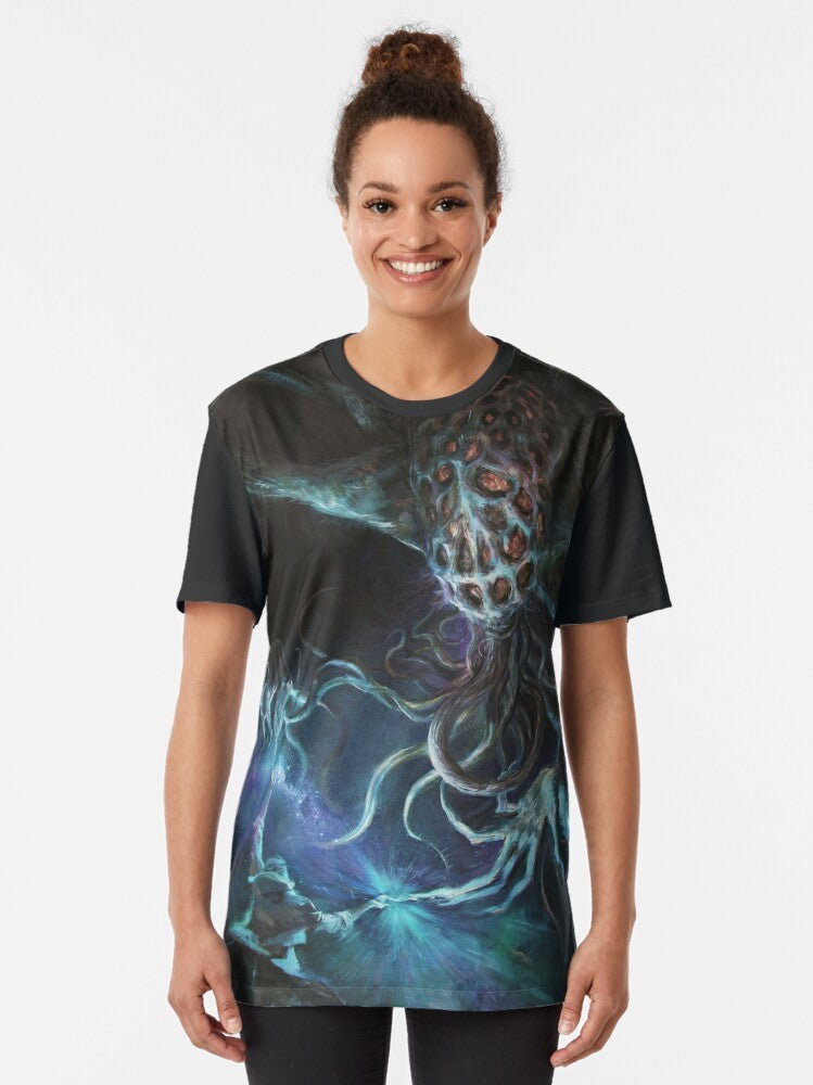 Intergalactic Alien Tentacle Graphic T-Shirt with a psychedelic, Lovecraft-inspired design featuring a blue alien creature with tentacles against a starry, galactic backdrop. - Women