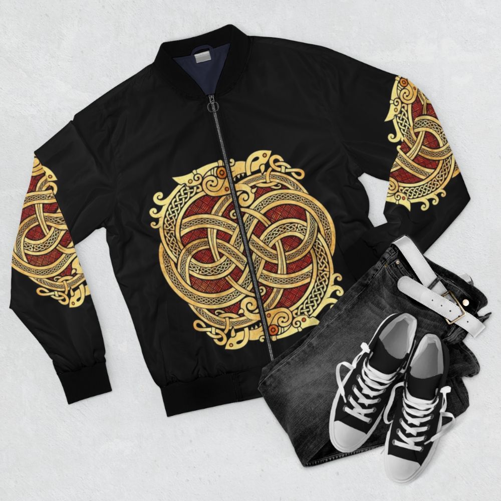 Celtic dragon design on a bomber jacket - Flat lay