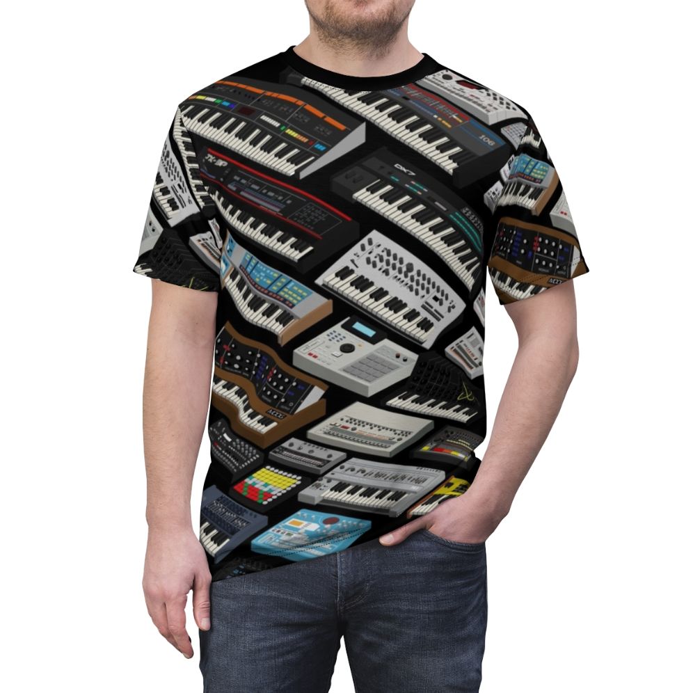 Person wearing a t-shirt with a synthesizer design, celebrating the love for electronic music production and vintage synths. - men front