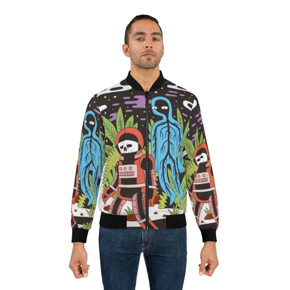 Ghost Space Bomber Jacket - A sci-fi inspired outerwear piece featuring a bold, graphic design of a dead astronaut in outer space. - Lifestyle