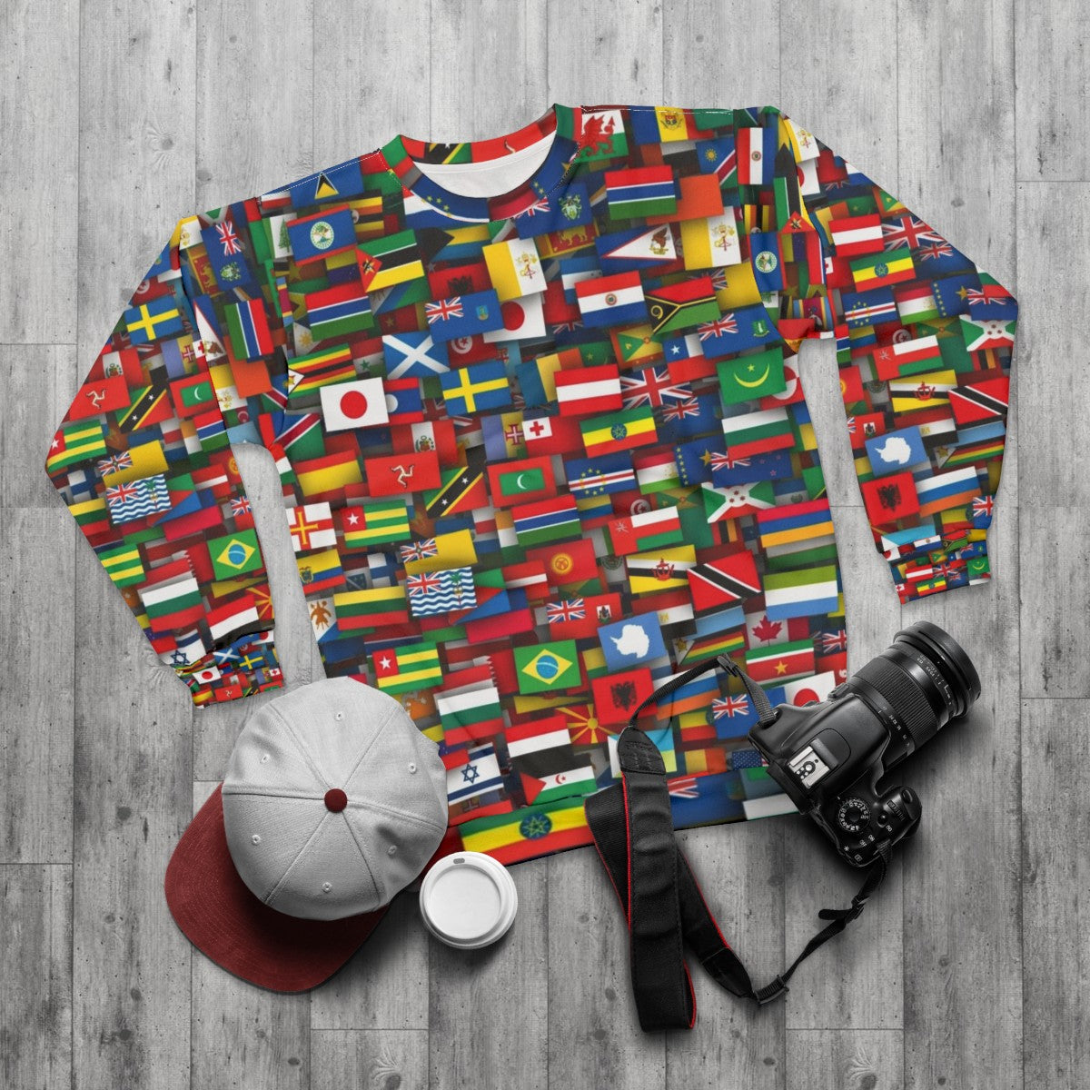 Sweatshirt with designs of flags from countries around the world - flat lay