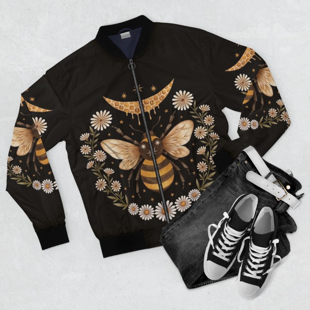 Honeymoon bomber jacket with bee, honeycomb, and floral design - Flat lay