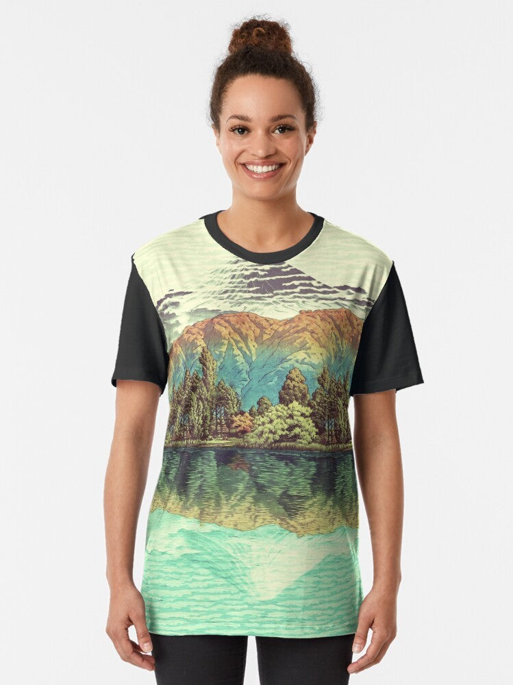 Ukiyo-e inspired nature landscape graphic t-shirt featuring hills, lake, reflection, and Mount Fuji - Women