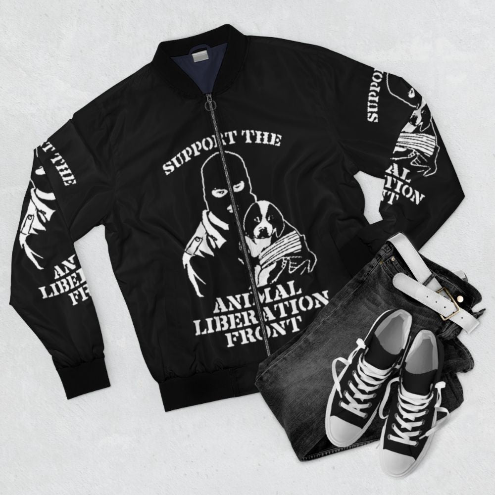 "Animal Liberation" vegan bomber jacket with animal rights graphic - Flat lay