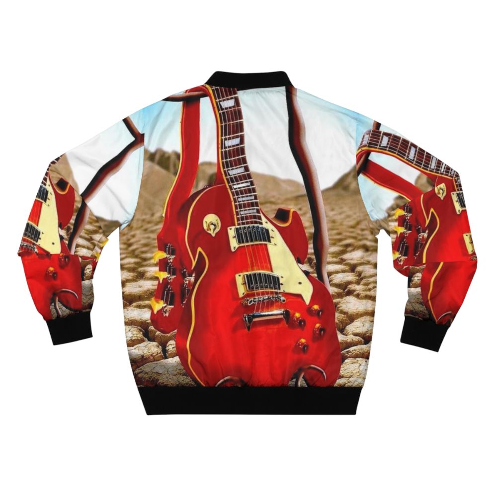 Vintage abstract bomber jacket with a surreal, psychedelic melted guitar and desert design. - Back