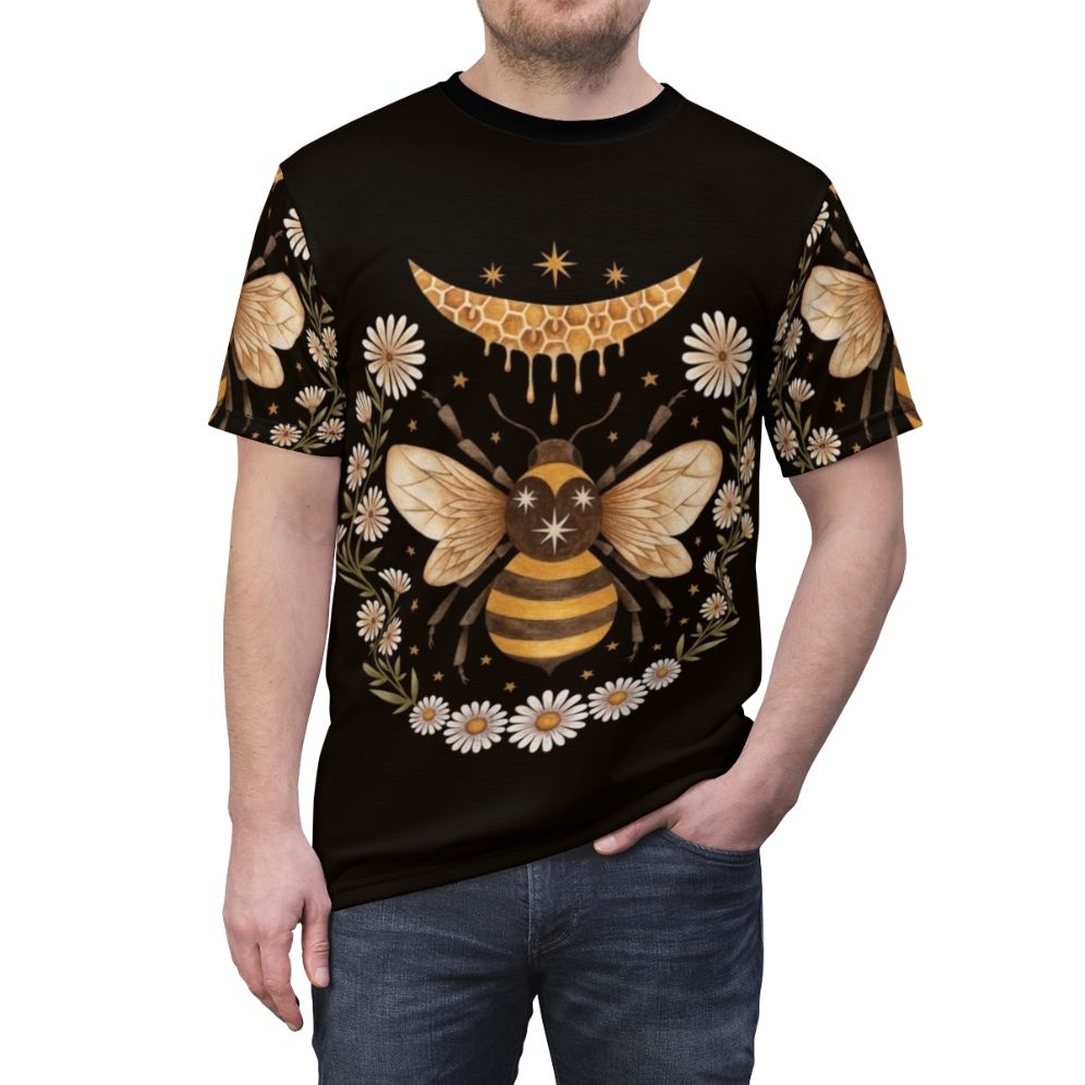 A black t-shirt featuring a honey moon design with bees, flowers, and a laurel wreath - men front