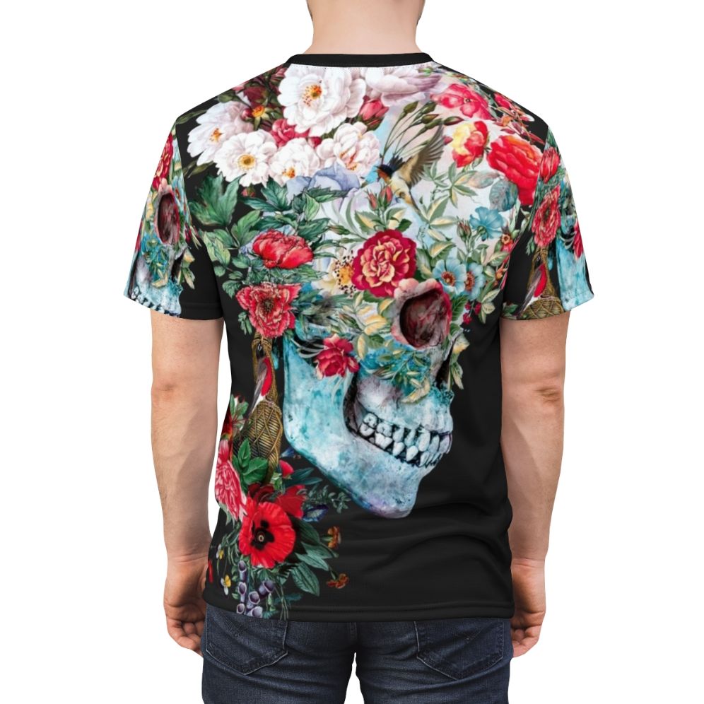 A surreal graphic t-shirt featuring a collage of gothic imagery including a skull, flowers, and other natural elements. - men back