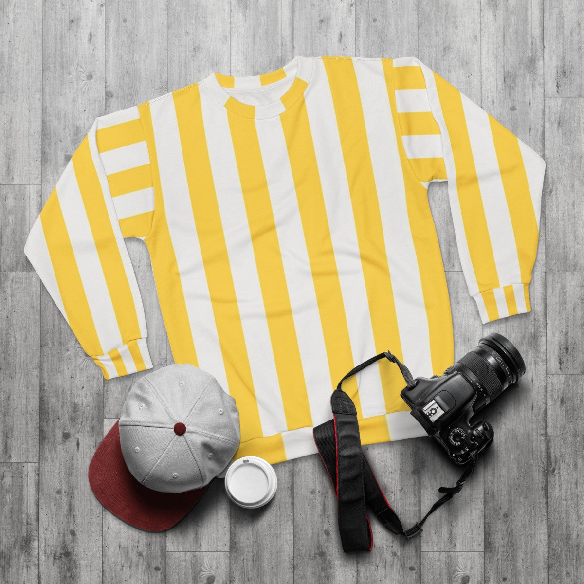 Vintage-style yellow and white vertical stripes sweatshirt - flat lay