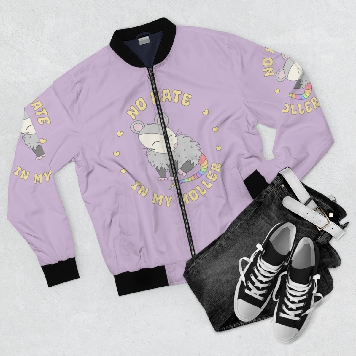 Pastel rainbow-colored bomber jacket with a cute opossum graphic, perfect for West Virginia pride. - Flat lay