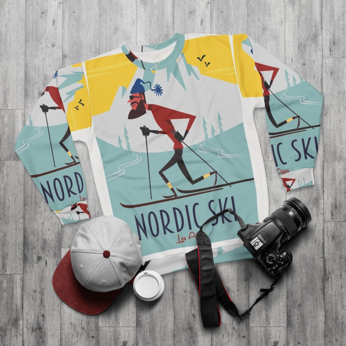 Nordic ski poster printed on a cozy sweatshirt - flat lay