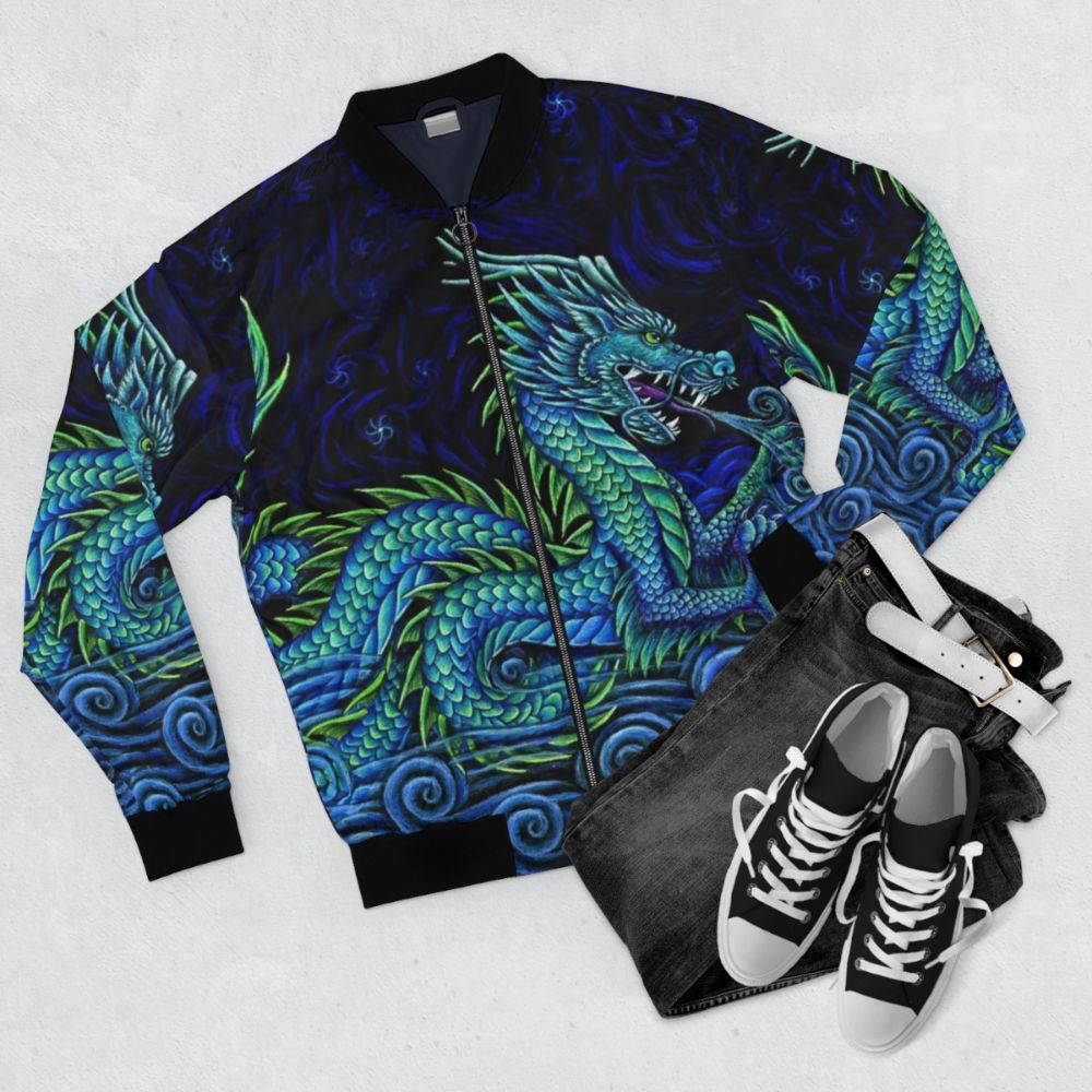 An image of a colorful bomber jacket featuring a vibrant, mythical azure dragon design. - Flat lay